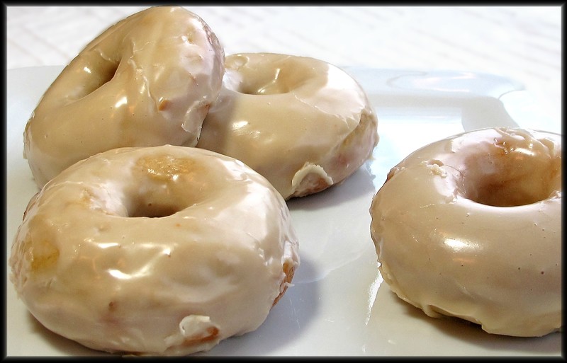 Baked donuts with vanilla glaze. BY JACK CLEMONS